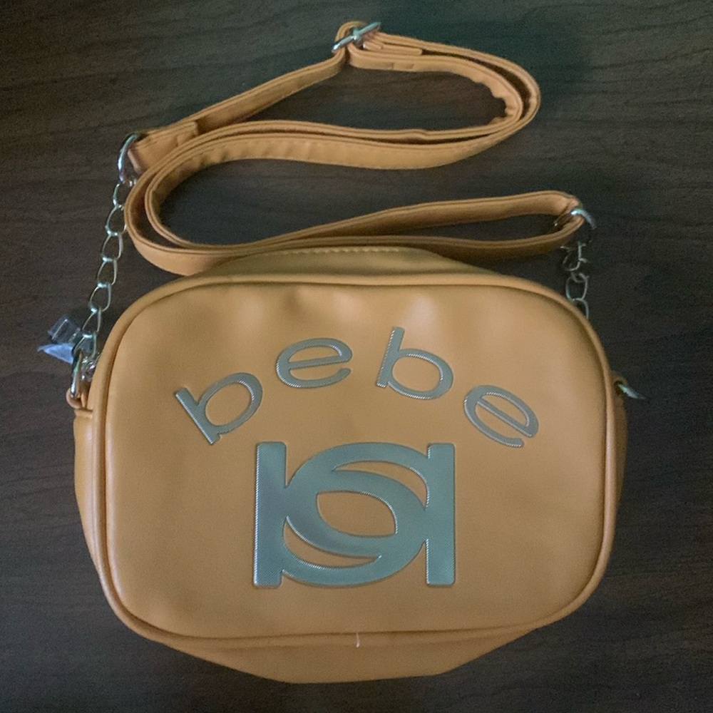 bebe tan crossbody bag with silver logo